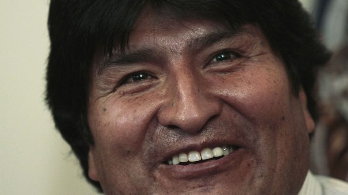 Bolivian President Evo Morales smiles during a news conference at the presidential residence in La Paz