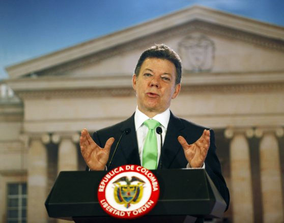 Colombia's President Juan Manuel Santos talks to the media during a news conference at the presidential palace in Bogota