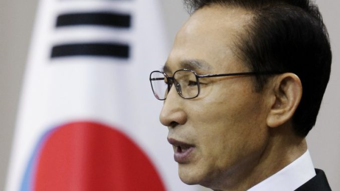 South Korean President Lee speaks to the nation during a news conference at the presidential house in Seoul