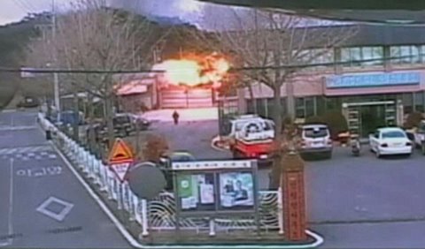 A TV grab shows the moment of impact of one of the artillery shells fired by North Korea on the South Korean island of Yeonpyeong