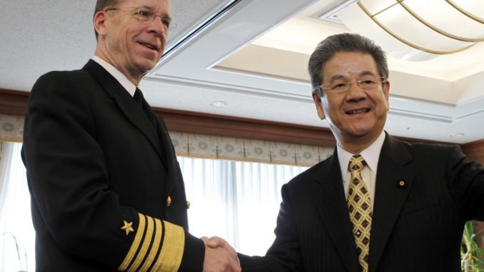 U.S. Chairman of the Joint Chiefs of Staff Admiral Mullen meets Japan's Defence Minister Kitazawa at the latter's office in Tokyo