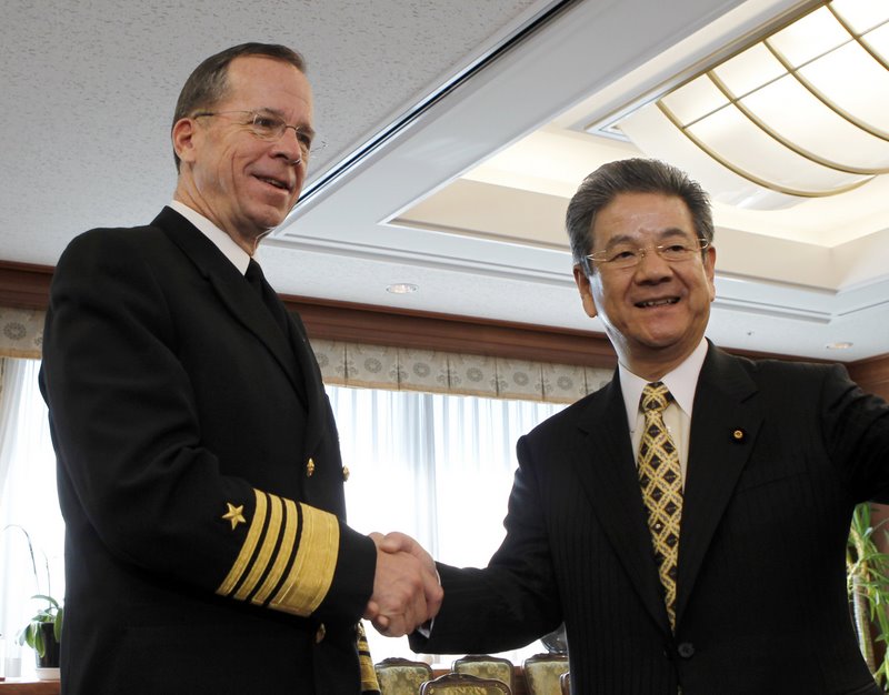 U.S. Chairman of the Joint Chiefs of Staff Admiral Mullen meets Japan's Defence Minister Kitazawa at the latter's office in Tokyo