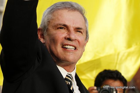 Peruvian presidential candidate astaneda waves after registering his candidature at the Electoral Special Jury in Lima