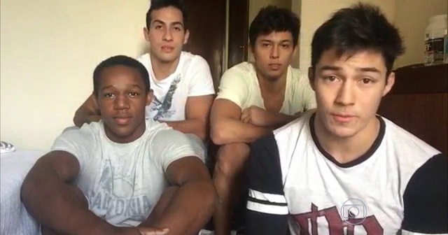 Los tres gimnastas sancionados junto a Assunção.
