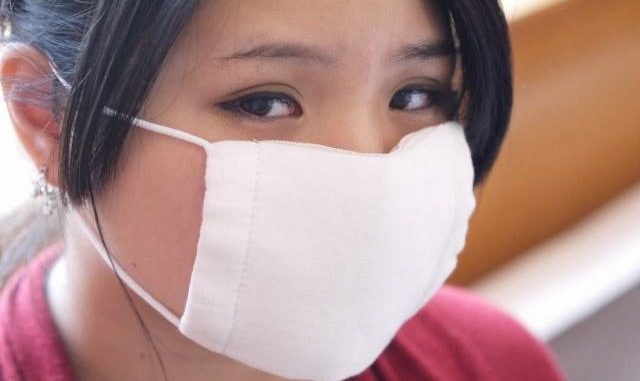 Uso de máscara para prevenir el contagio.