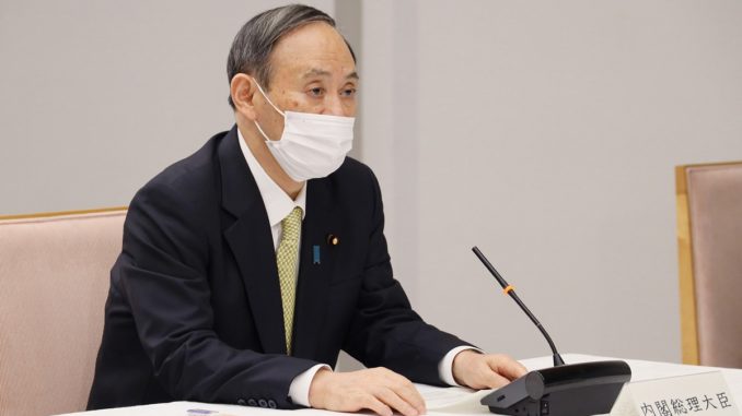 Suga en reunión de trabajo (Kantei)