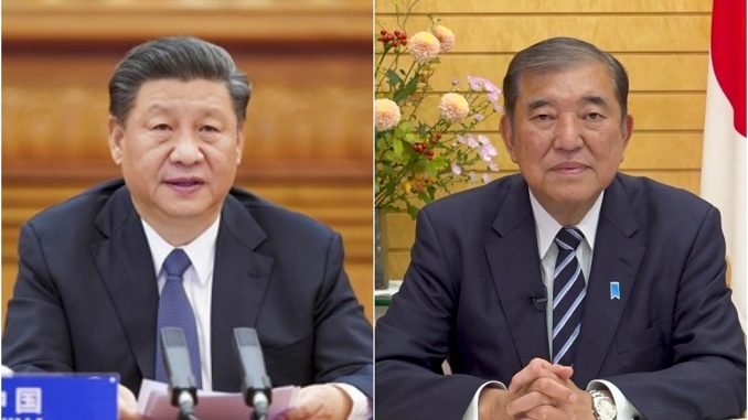 Xi Jinping y Shigeru Ishiba